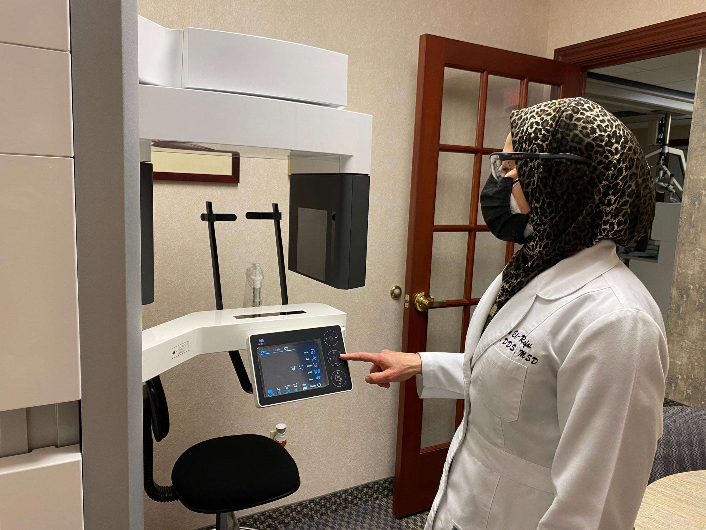 Dr. El-Refai setting up a scan at the controls of the small-field 3D cone beam scanner
